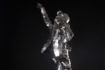 Unique reflective sculpture of a figure with a raised fist