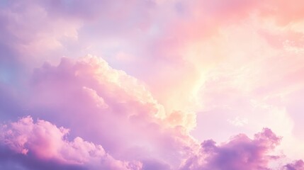 Beautiful pastel cloud floating softly in a clear blue sky at sunset