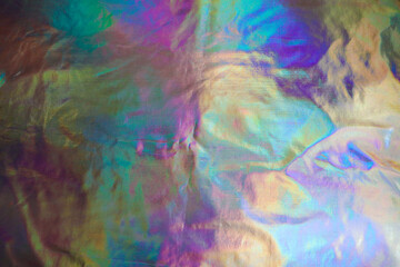 Holographic fabric. Holographic texture. Rainbow effect.