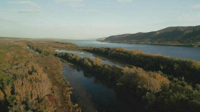 River flowing between islands in autumn