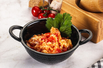 Shakshuka with tomato for breakfast