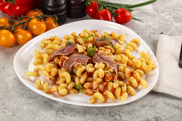 Italian pasta cellentani with anchovy