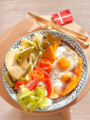 Sunny side up egg with vegetables and mixed fruits for breakfast. Delicious food. Cooking recipes. Bruch menu. Healthy recipes. Easy home cooking. Diet food dish. High Protein. Stay healthy.Clean food