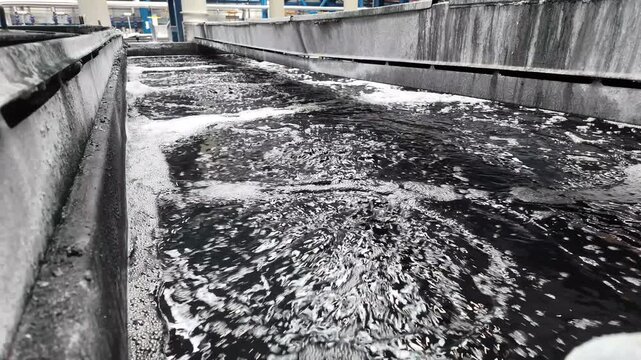 Large industrial bath for chemical treatment of metal products. Process in industrial factory