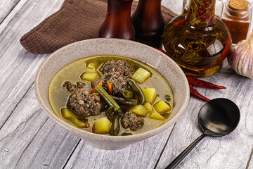 Soup with beef meatballs and vegetables