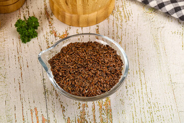 Brown flax seeds in the bowl