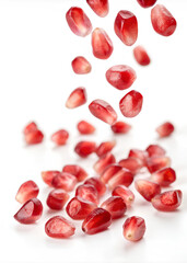 Pomegranate seeds, On isolated white background. Clipping path 