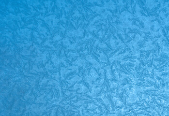 frost crystal on window glass in winter season