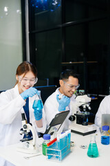 Fototapeta premium Dynamic science lab where a team of scientists collaborates on research, testing, and innovation