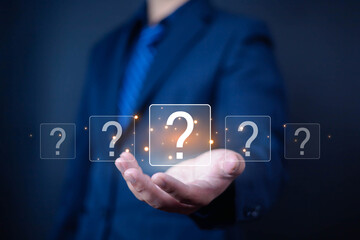 Question mark shows on a palm, Businessman show question mark wondering icon, Technology question...