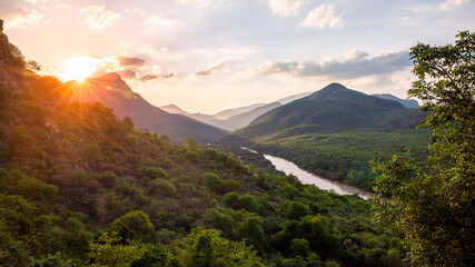Sunset over the mountains at Olifants River near Abel Erasmus Pass in South Africa