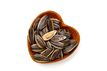 Roasted sunflower seeds on white background.