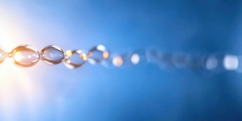 Translucent bubbles reflecting light in blue and orange gradient background