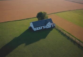 Here is an aerial view showcasing a large farm with cows and various buildings