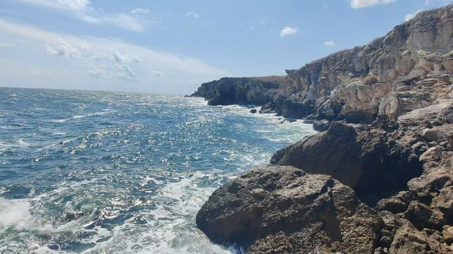 Waves crashing on rocks