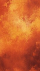 Obraz premium Rich orange and terracotta textured background resembling a vibrant sunset or autumn landscape during golden hour