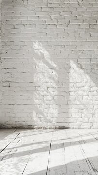 White brick wall with streaks and natural light creating a serene atmosphere for minimalistic decor