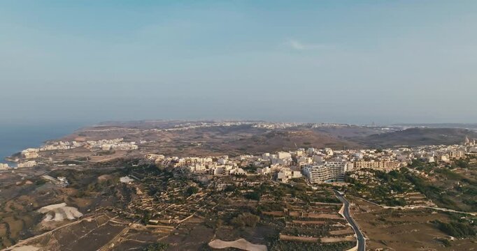 Aerial view cityscape of Zebbug island of Gozo Malta. Streets of the city on the shore of the Mediterranean Sea in the beautiful nature of Europe. High quality 4k footage