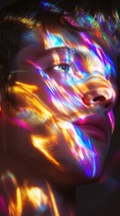 Vibrant portrayal of a filmmaker with colorful light patterns on the face in an artistic setting