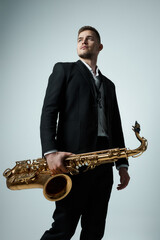 Fototapeta premium saxophone player in a studio