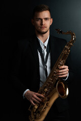 Naklejka premium man with saxophone