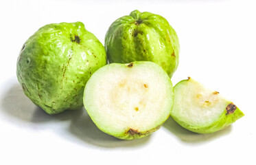 several guava fruits isolated on a white background