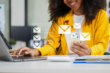 Email notification concept, Female use smartphone and laptop receive message alert in the mailbox.