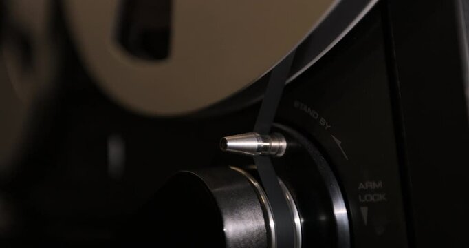 Tape audio music player, studio magnetic tape, vintage retro spool reel to reel player. Old school concept.