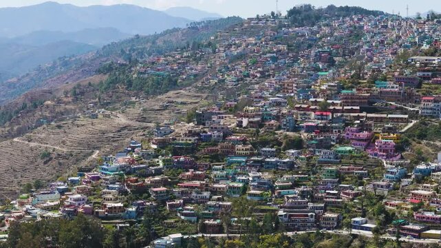Aerial Drone shot of crowded city from top situated on top of the hill, almora uttarakhand