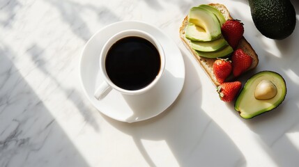 Elegant Breakfast with Coffee, Avocado, Toast, and Strawberries on Marble Surface