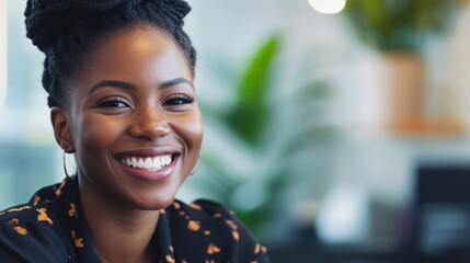 Happy female business professional with colleagues in meeting at office