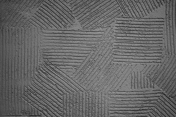 gray decorative plaster on the wall close-up