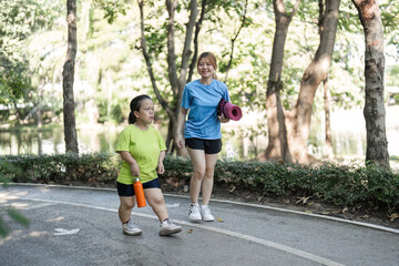 Petite Woman and Friend Enjoying a Morning Jog in a Lush Green Park Setting