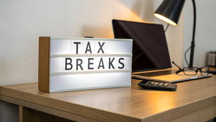 tax breaks - close up of sign in office