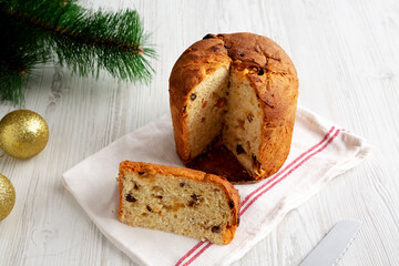 Homemade Italian Panettone Bread with Dried Fruit, side view.
