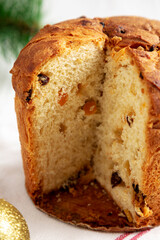 Homemade Italian Panettone Bread with Dried Fruit, side view. Close-up.