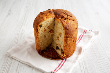 Homemade Italian Panettone Bread with Dried Fruit, side view.