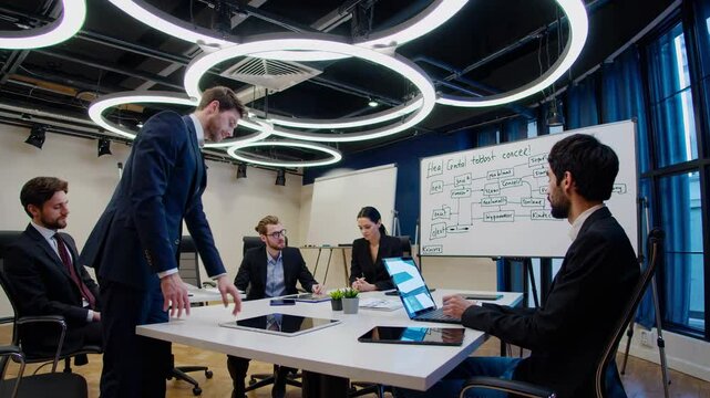 Corporate team meeting in modern conference room with innovative presentation methods