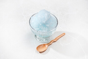 かき氷　cold dessert shaved ice with blue syrup