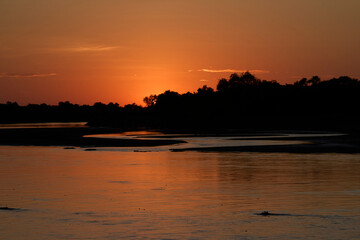 Naklejka premium Sunrise over the Luangwa River in Zambia bordering South Luangwa National Park
