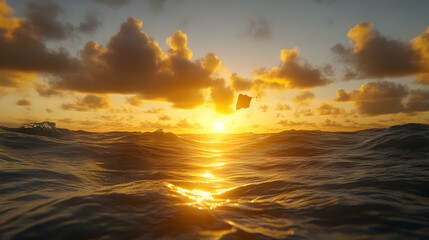 Stunning sunrise over ocean waves with plastic bag floating; environmental pollution concept.