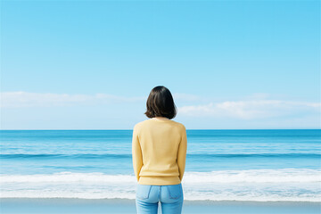 A solitary figure standing on a peaceful beach, gazing at the calm ocean under a clear sky, with ample copy space for creative use.