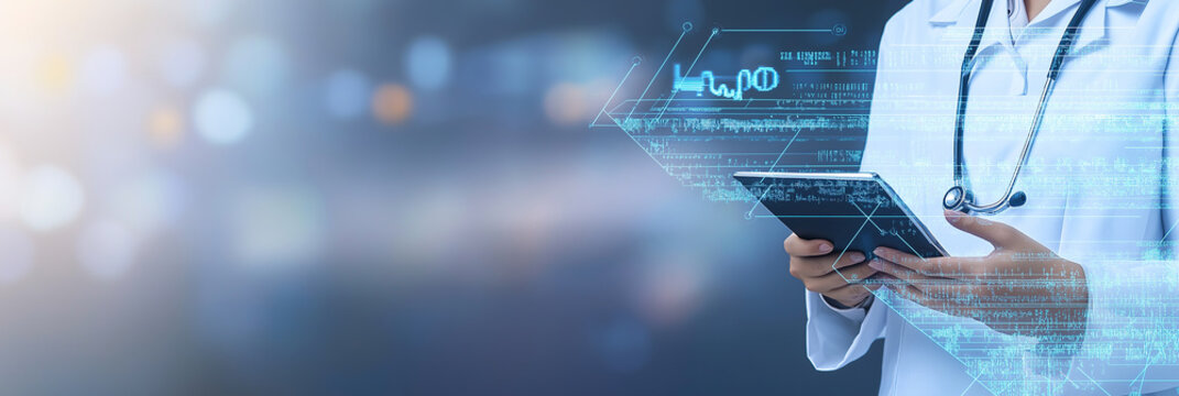 doctor typing on a digital tablet - digitalization of healthcare