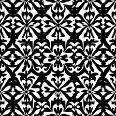 Fototapeta premium Black and White Floral Pattern: A captivating pattern of interlocking floral motifs in bold black and white, creating a striking and timeless design. Perfect for backgrounds, textiles.