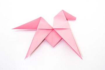 Little paper pony on white background. Origami animal. Paper crafts.