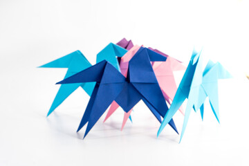 Little paper pony on white background. Origami animal. Paper crafts.
