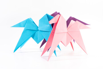 Little paper pony on white background. Origami animal. Paper crafts.