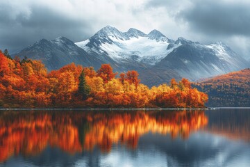 Obraz premium A beautiful autumn landscape with a lake and mountains in the background