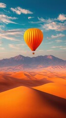 Fototapeta premium Orange Hot Air Balloon Soaring Over Majestic Desert Landscape at Sunrise