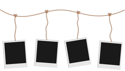 blank polaroid photo frames hanging from string